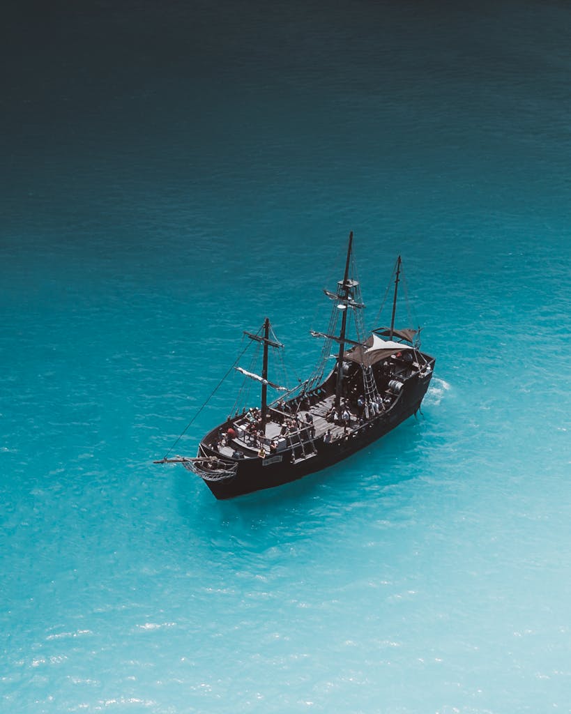 A Pirate Ship Sailing on Blue Sea